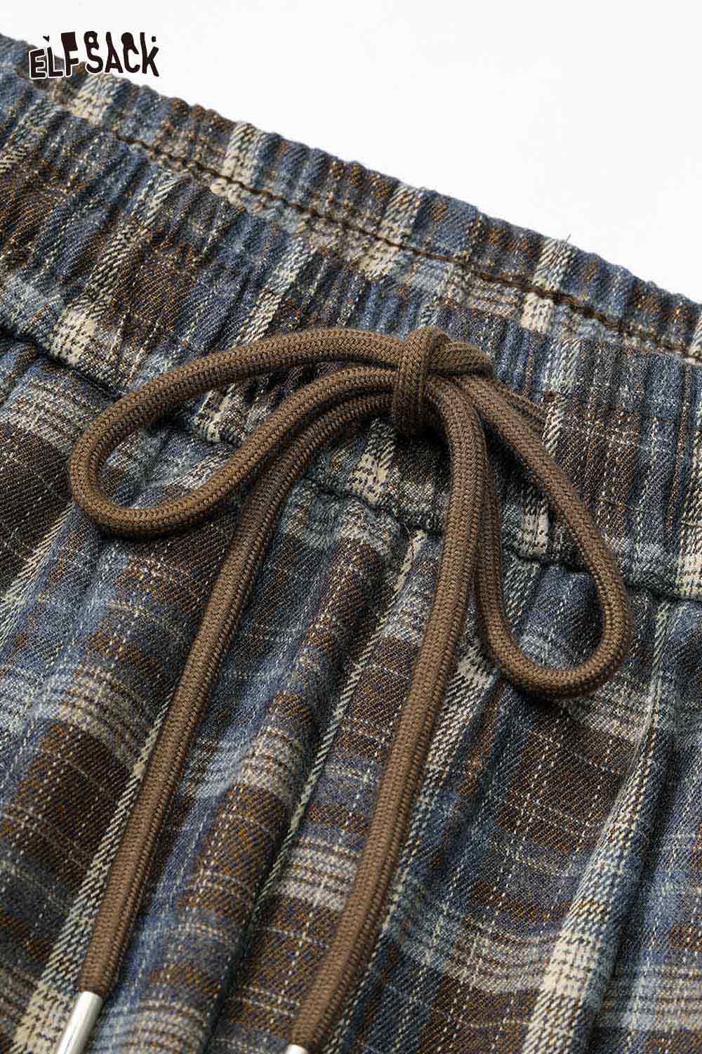 ELFSACK women's check pattern relaxed fit trousers featuring an elastic waistband and drawstring detail