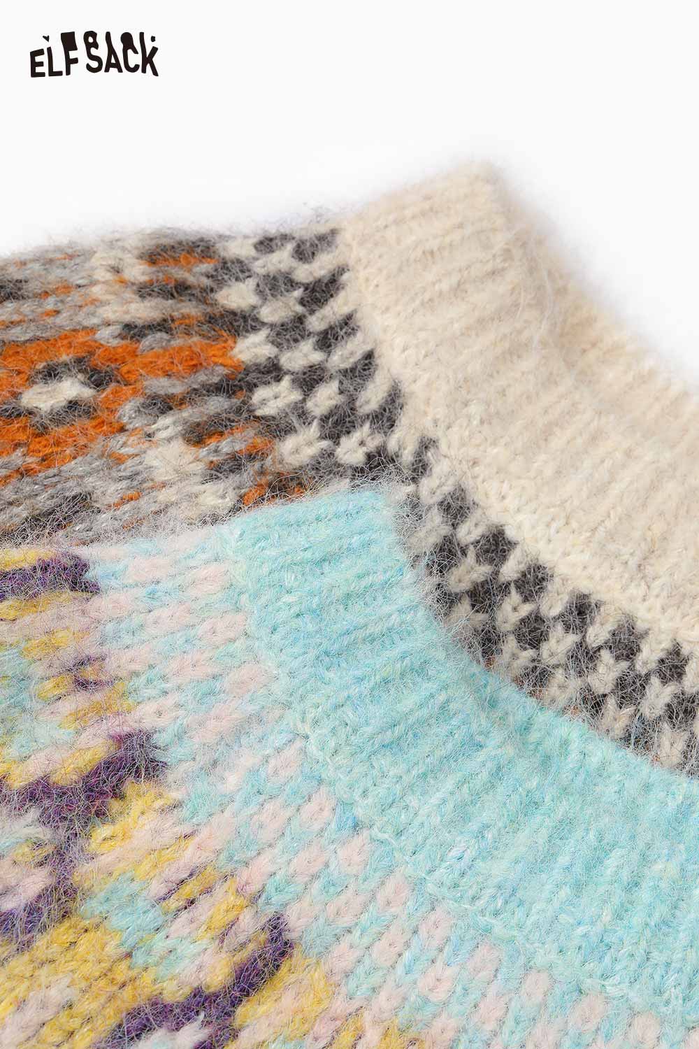 Close-up of ELFSACK women's Christmas stripe sweater featuring colorful patterns and a cozy neckline