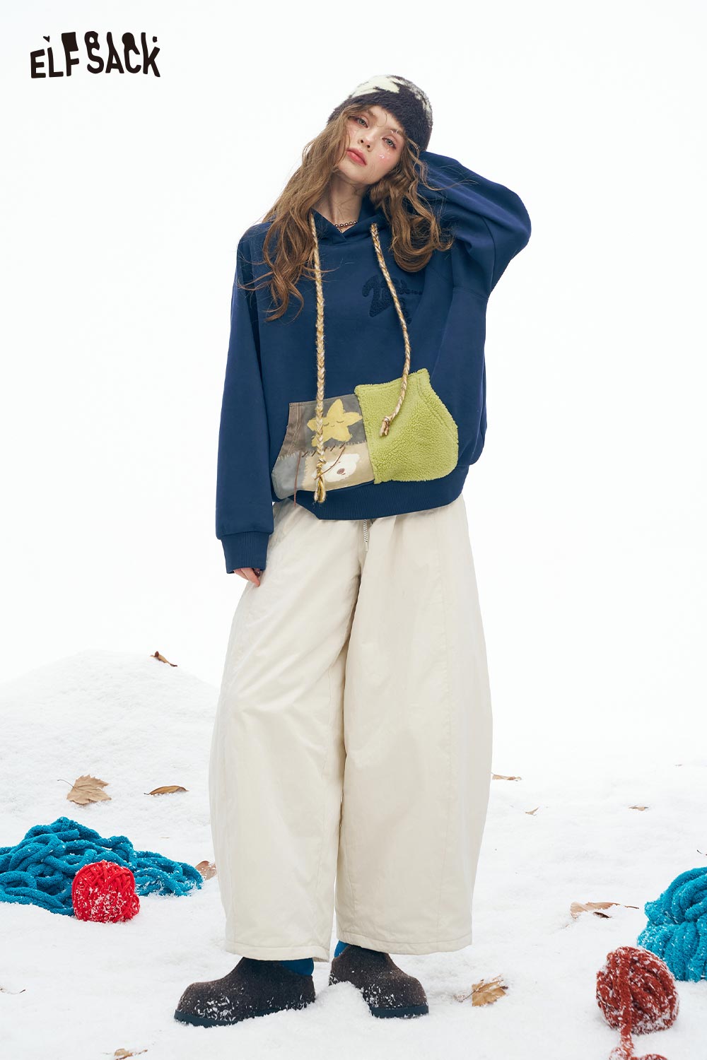 ELFSACK women's color block hooded sweatshirt with unique patch design and cozy fit for winter style