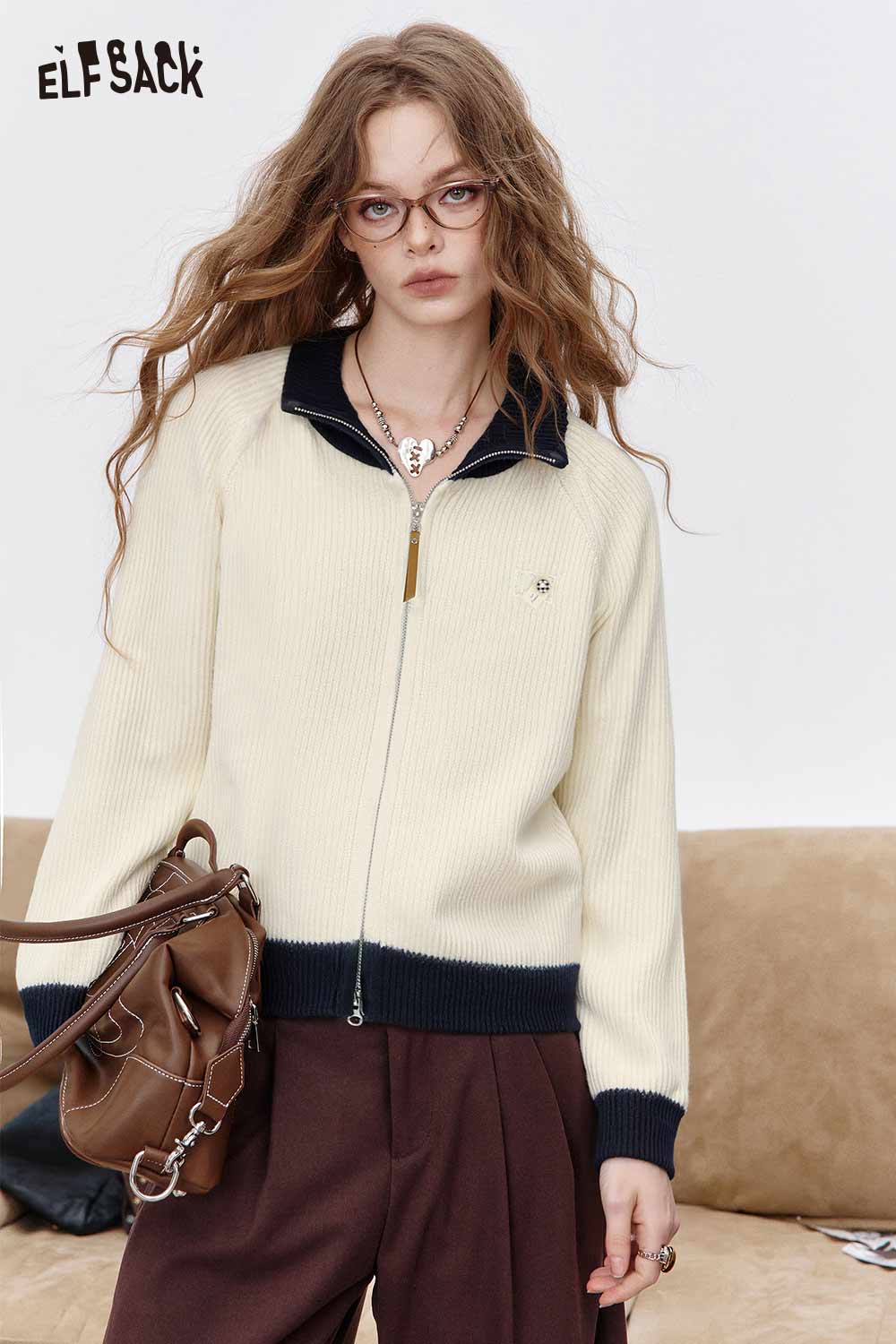 ELFSACK women's color block knit cardigan in cream and navy with a zipper front style