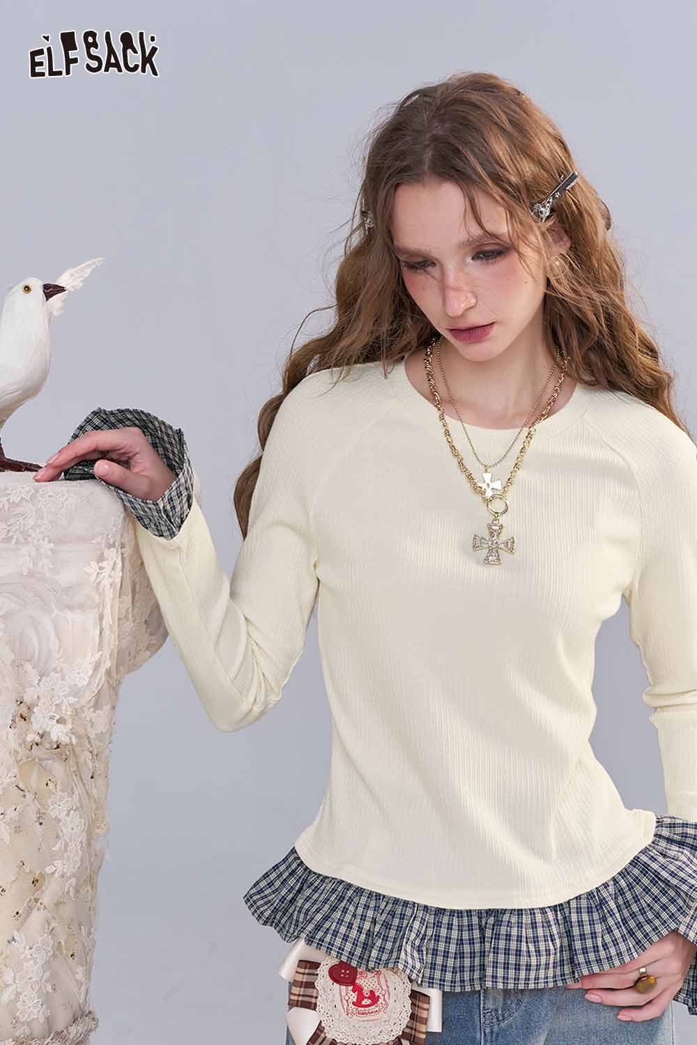 ELFSACK women's color block knit pullover featuring a ruffled hem and stylish design