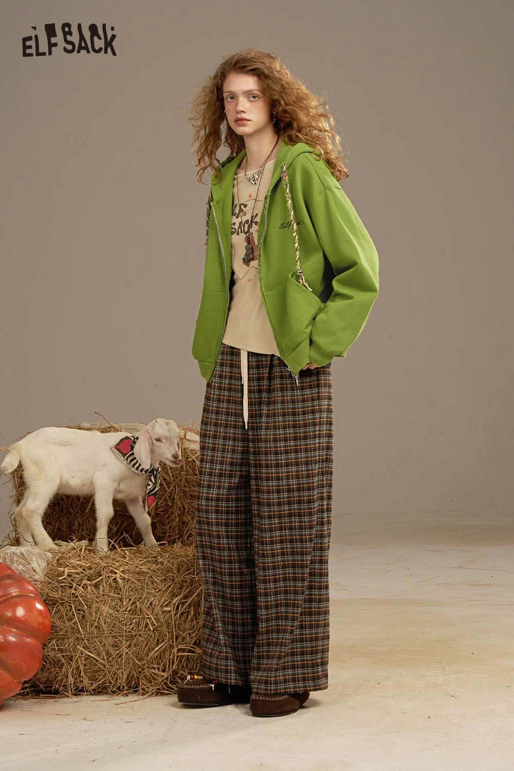 ELFSACK women's colorful hooded jacket styled with plaid pants and a casual tee