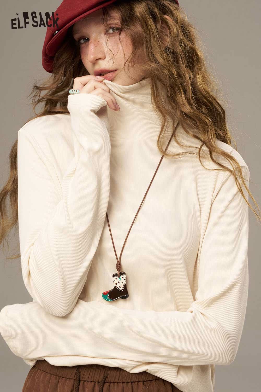 ELFSACK women's cozy turtleneck sweater in cream with long sleeves and stylish neck design