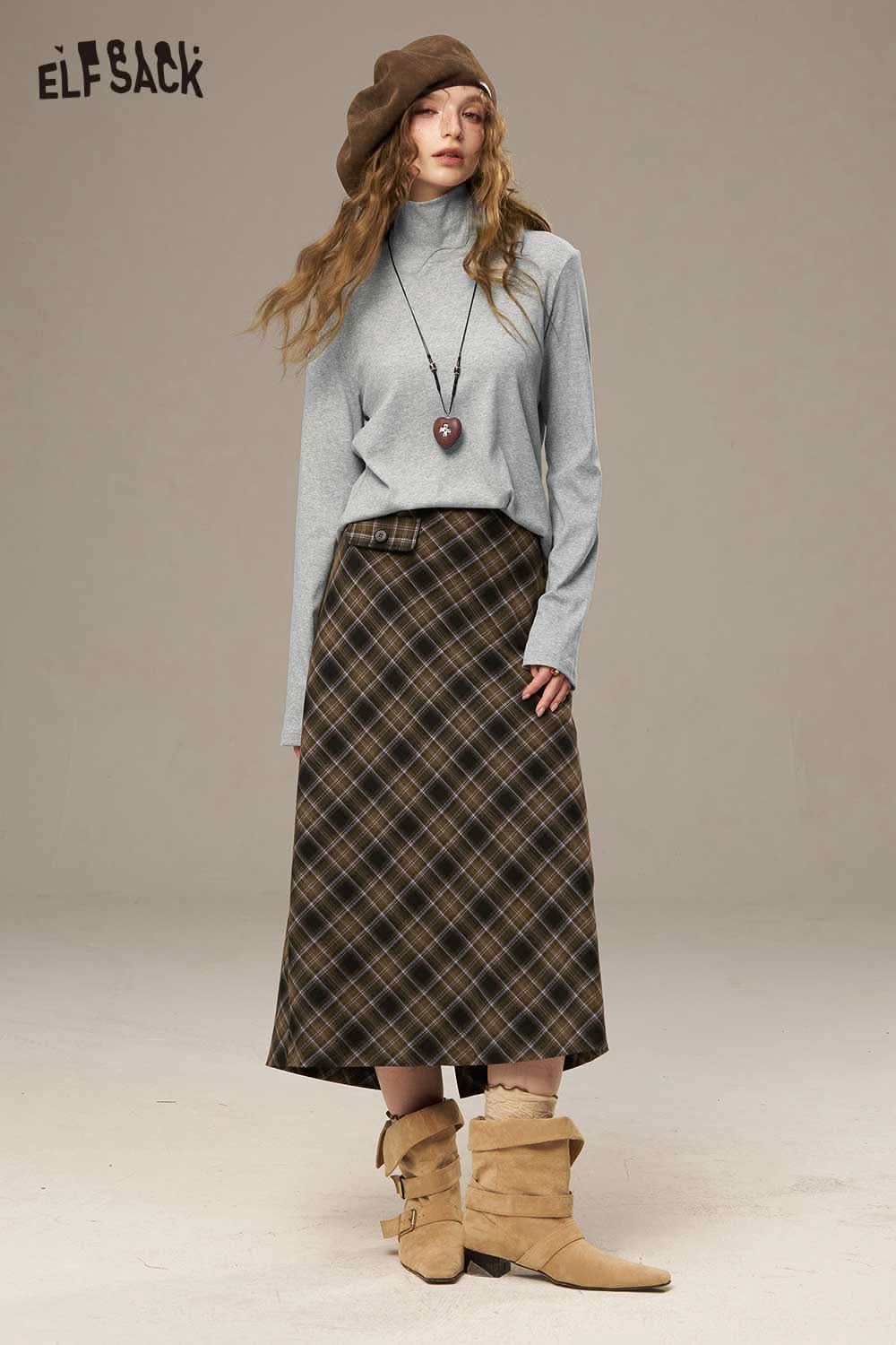 ELFSACK women's cozy turtleneck sweater styled with a patterned skirt and stylish accessories