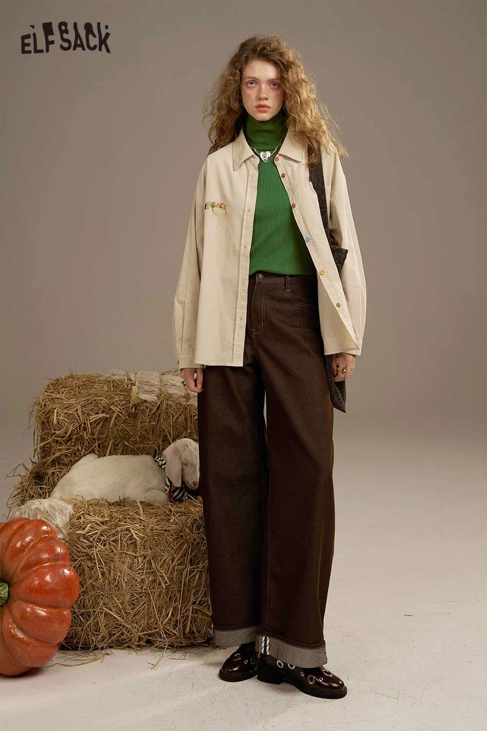 ELFSACK women's cozy turtleneck sweater in green paired with oversized brown pants for a stylish look