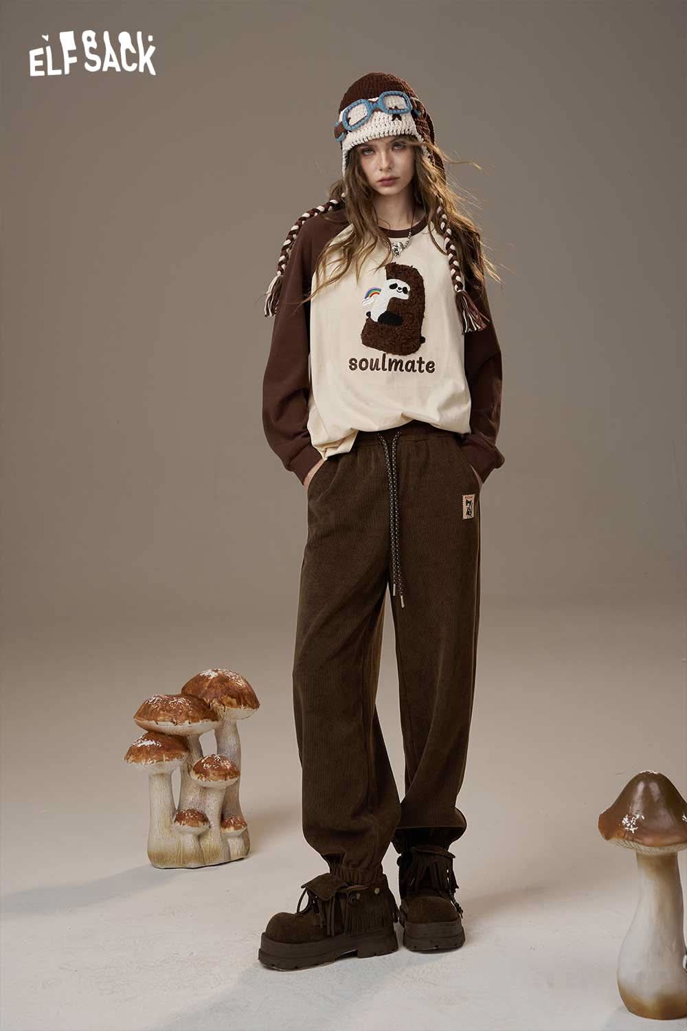 ELFSACK women's drawstring waist pants in brown, paired with a stylish graphic sweatshirt for a casual look