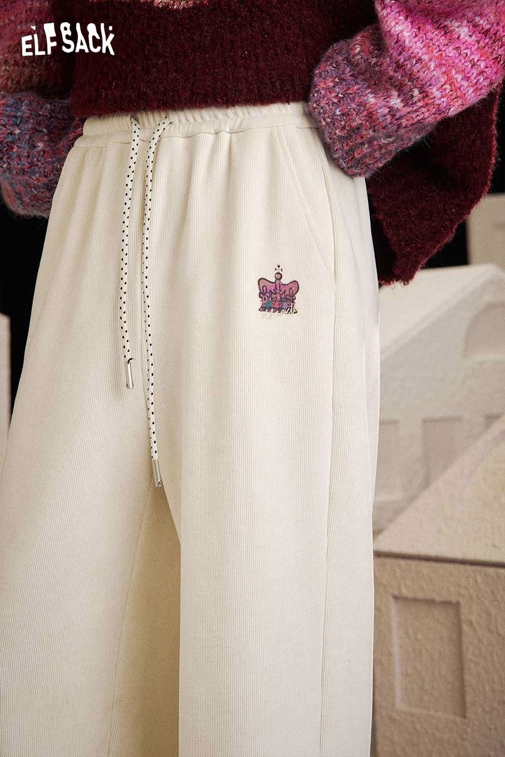 ELFSACK women's drawstring waist pants in cream with subtle crown logo detail and elastic waistband