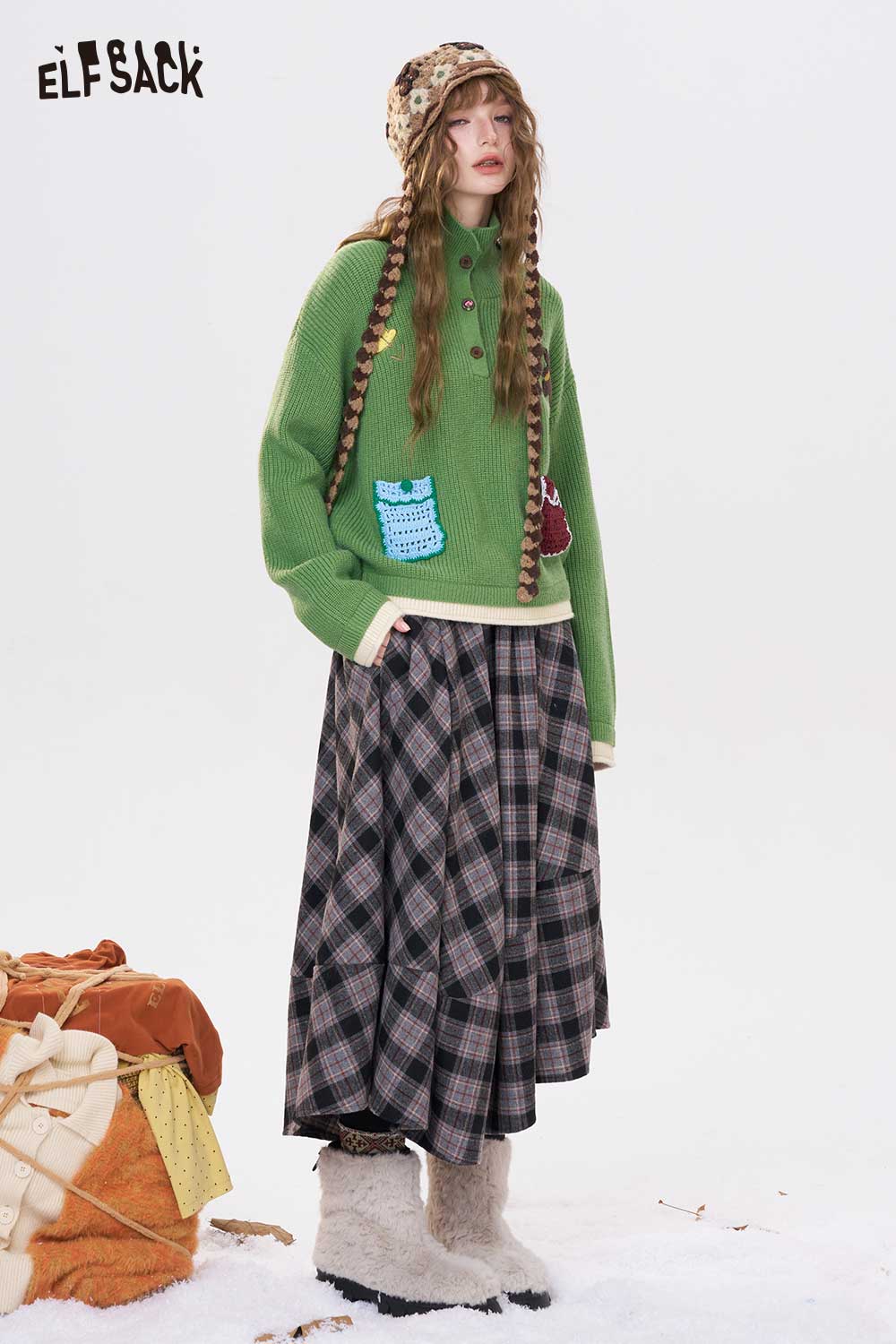ELFSACK women's embroidered stand collar sweater in green paired with a plaid skirt for a trendy fall look