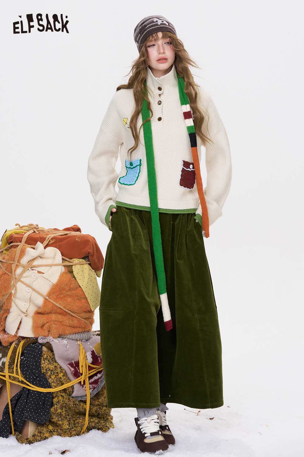 ELFSACK women's embroidered stand collar sweater styled with a long green skirt and winter accessories
