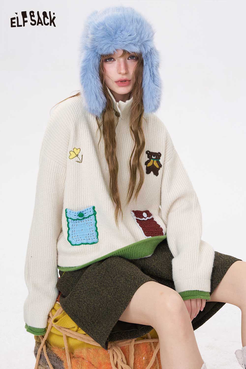 ELFSACK women's embroidered stand collar sweater in cream with playful pocket designs and a cozy fit