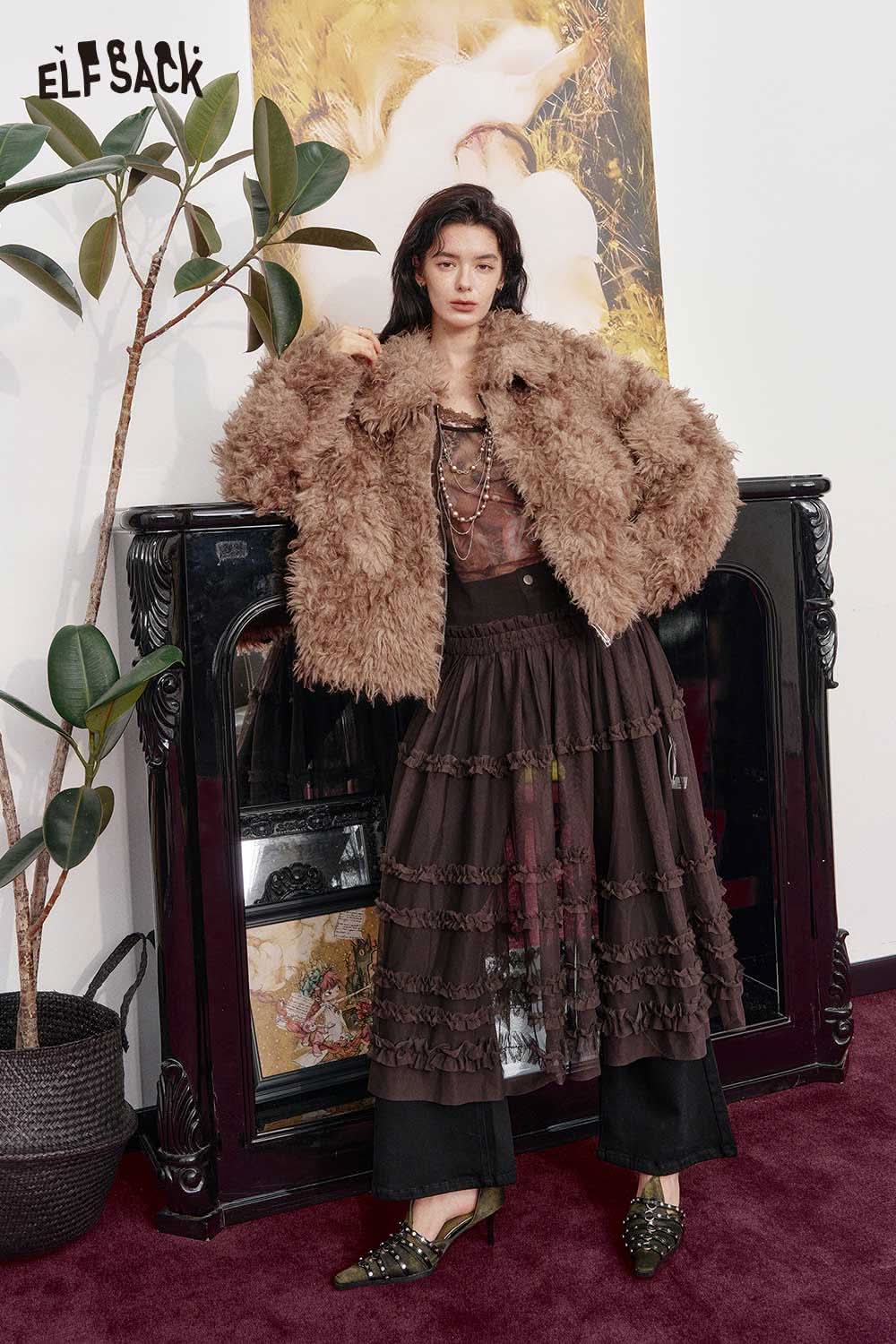 ELFSACK women's flared stretch denim jeans paired with a stylish brown faux fur jacket