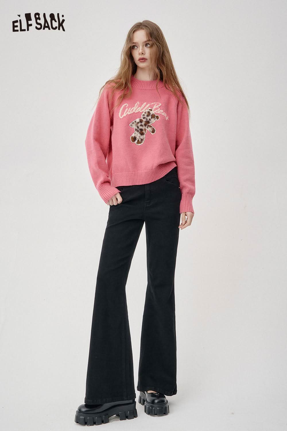 ELFSACK women's flared stretch denim jeans paired with a pink sweater for a modern casual look