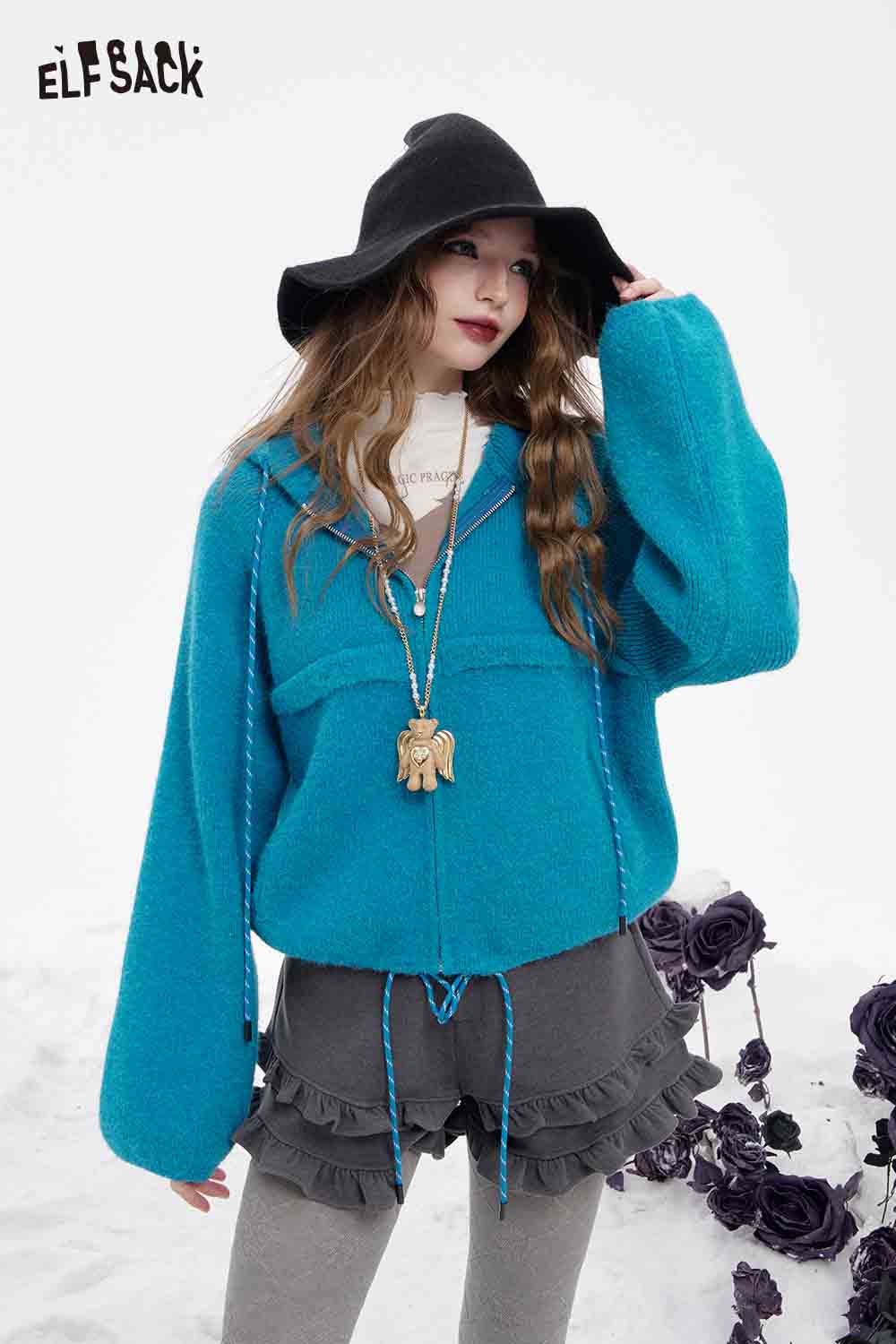 ELFSACK women's fleece hooded sweater in vibrant teal with oversized sleeves and drawstring details
