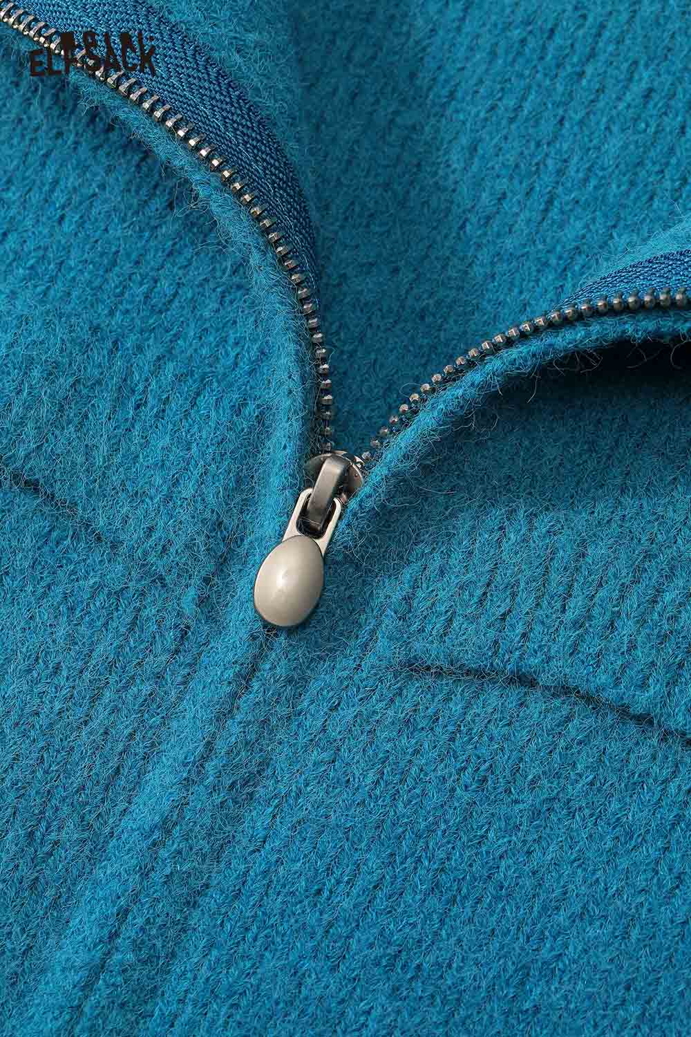 Close-up of ELFSACK women's fleece hooded sweater featuring a zip closure and textured fabric