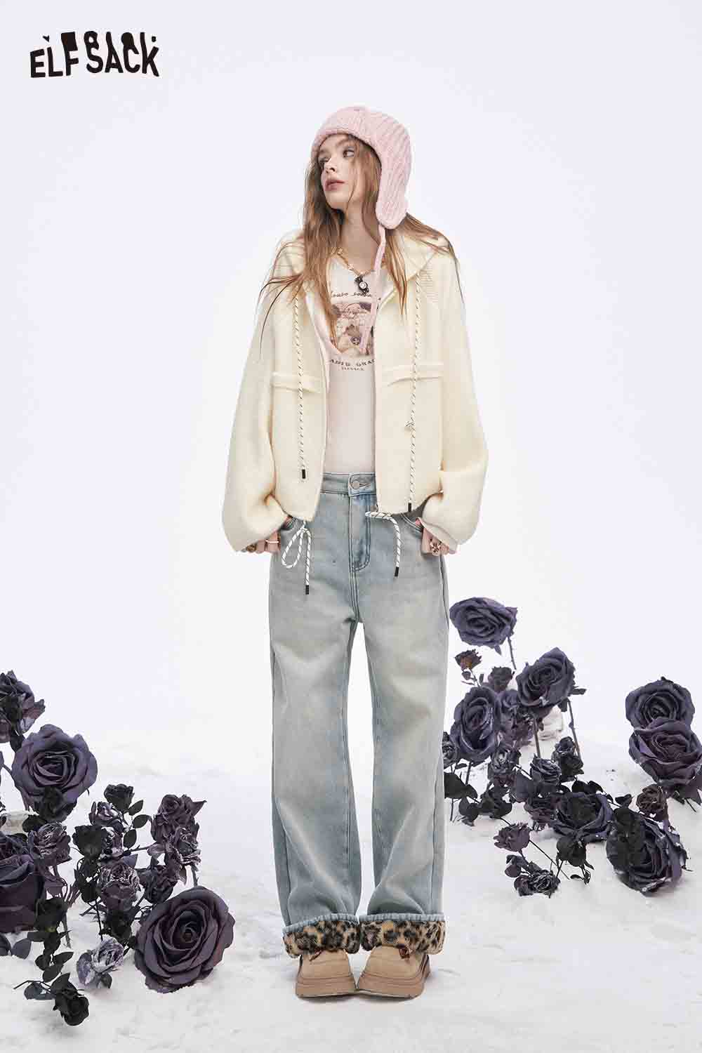 ELFSACK women's fleece hooded sweater styled with wide-leg jeans and a cute pink beanie in a floral setting