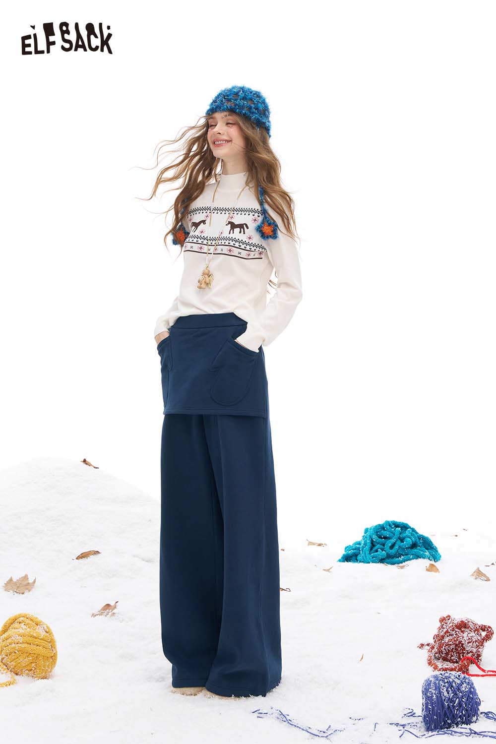 ELFSACK women's floor length wide leg pants paired with a cozy sweater for a stylish winter look