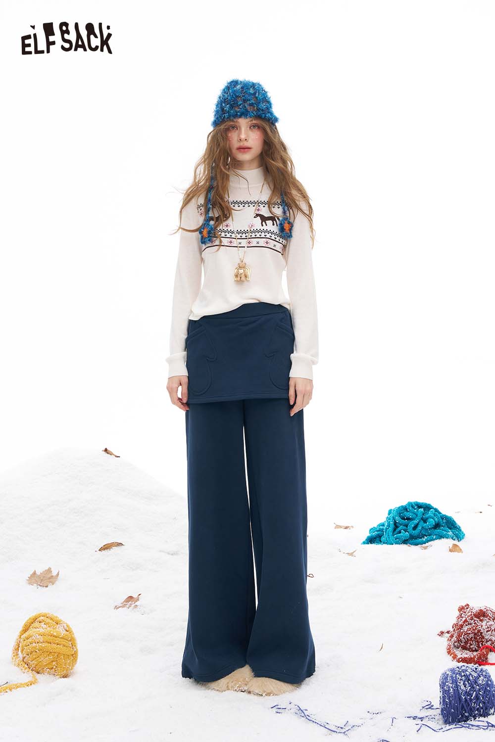 ELFSACK women's floor length wide leg pants in navy, paired with a stylish top and hat