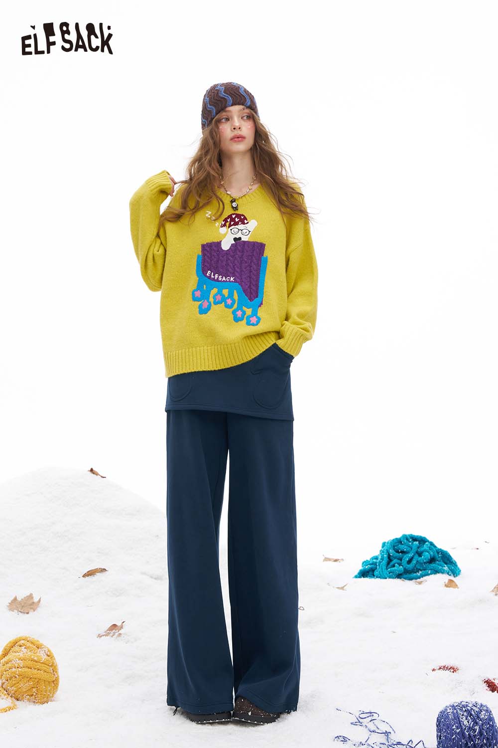 ELFSACK women's floor length wide leg pants paired with a colorful sweater for a stylish winter look