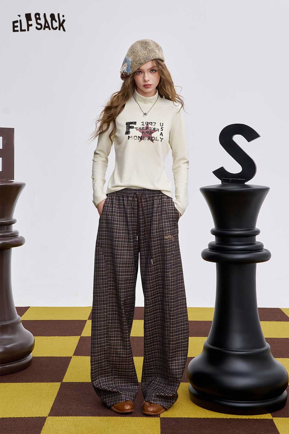 ELFSACK women's graphic long sleeve t-shirt in cream with stylish lettering design for casual wear