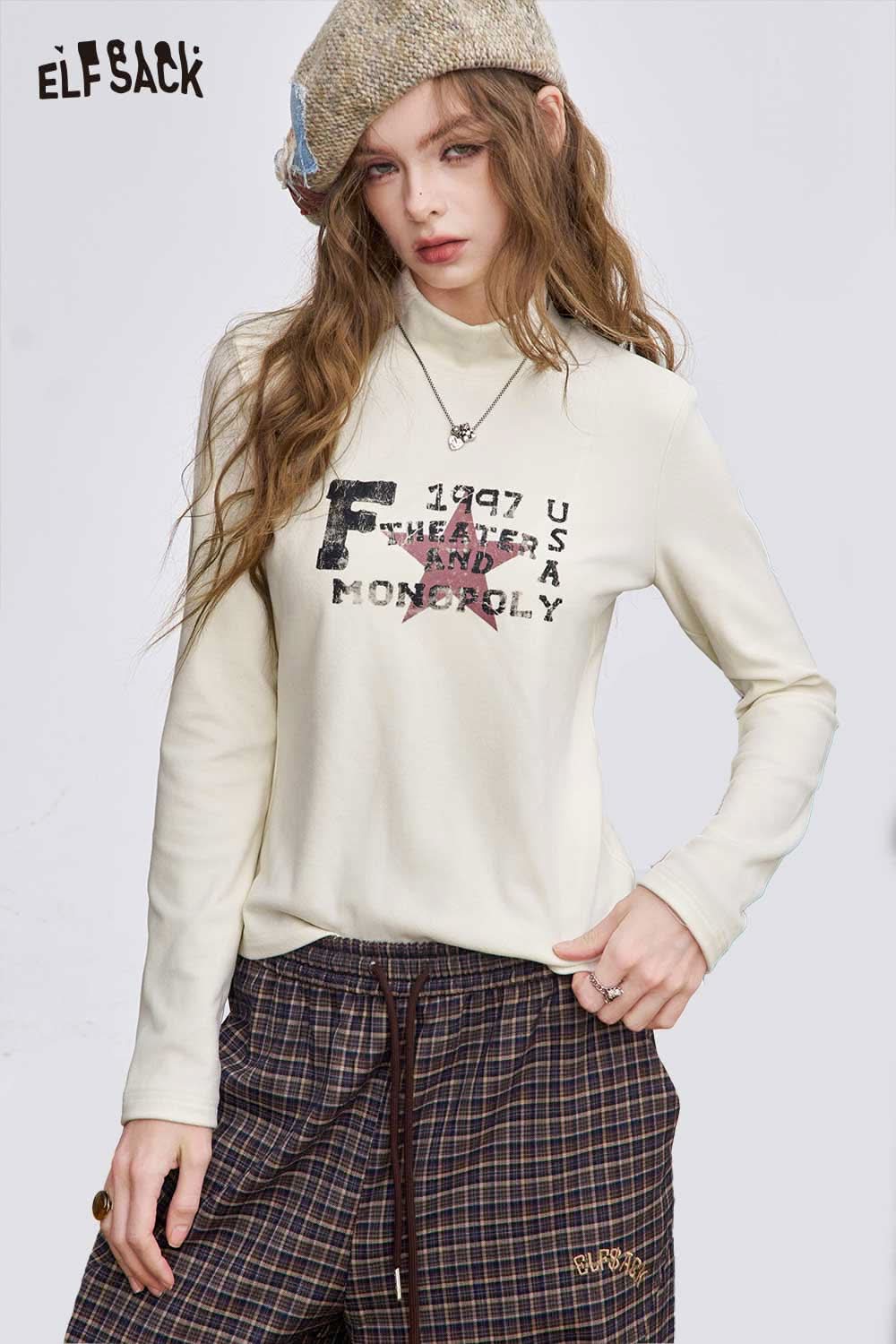 ELFSACK women's graphic long sleeve t-shirt in cream featuring a trendy design and comfortable fit