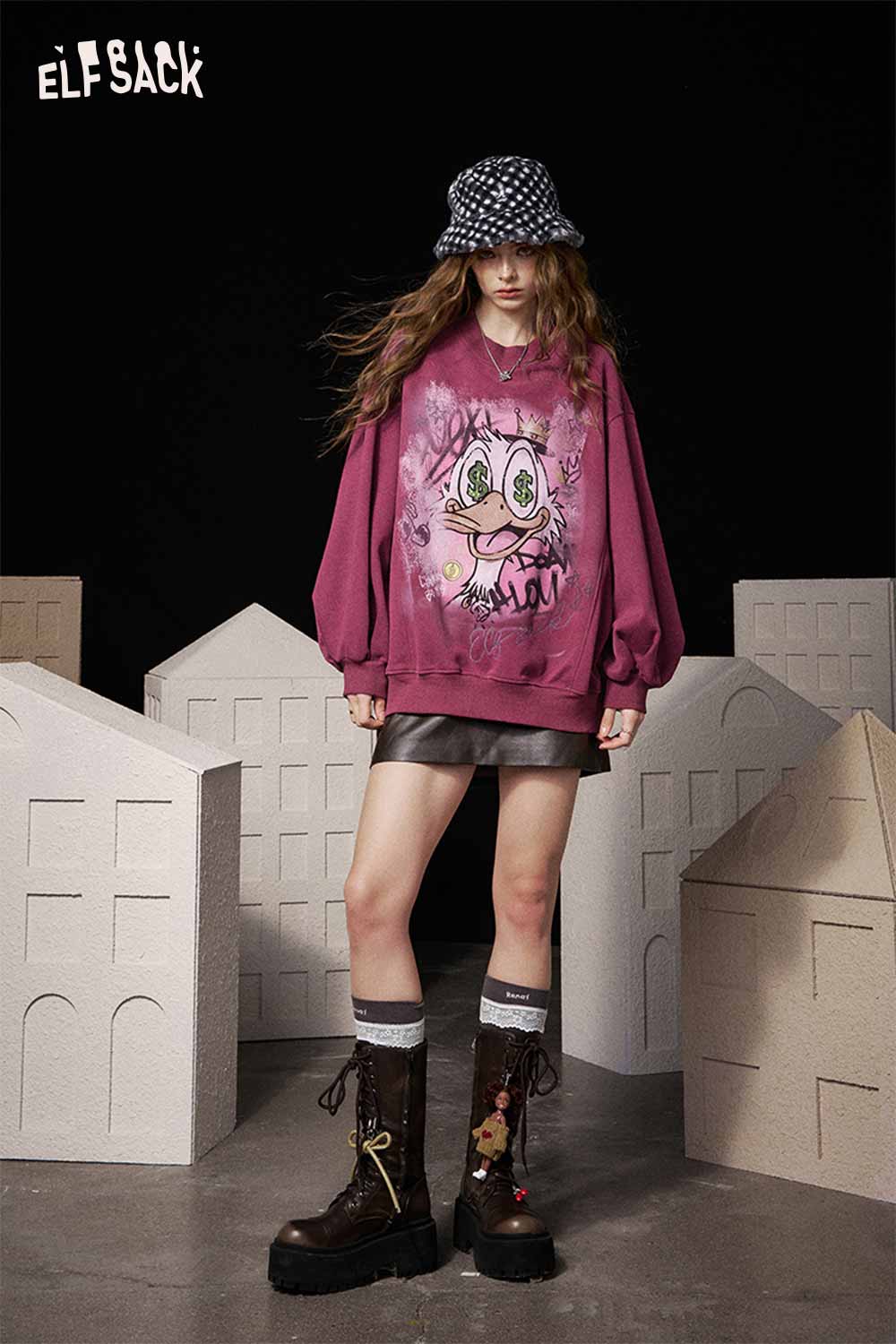 ELFSACK women's graphic long sleeve tshirt in maroon featuring a playful cartoon design and stylish oversized fit