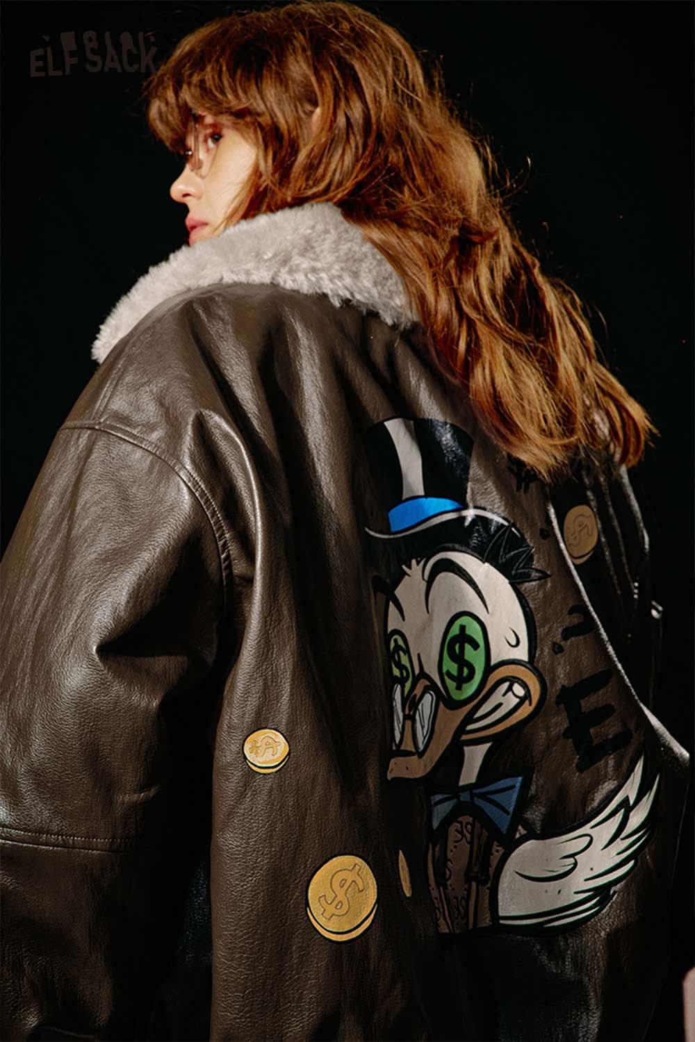 ELFSACK women's graphic plush leather jacket featuring a stylish cartoon design and cozy fur lining