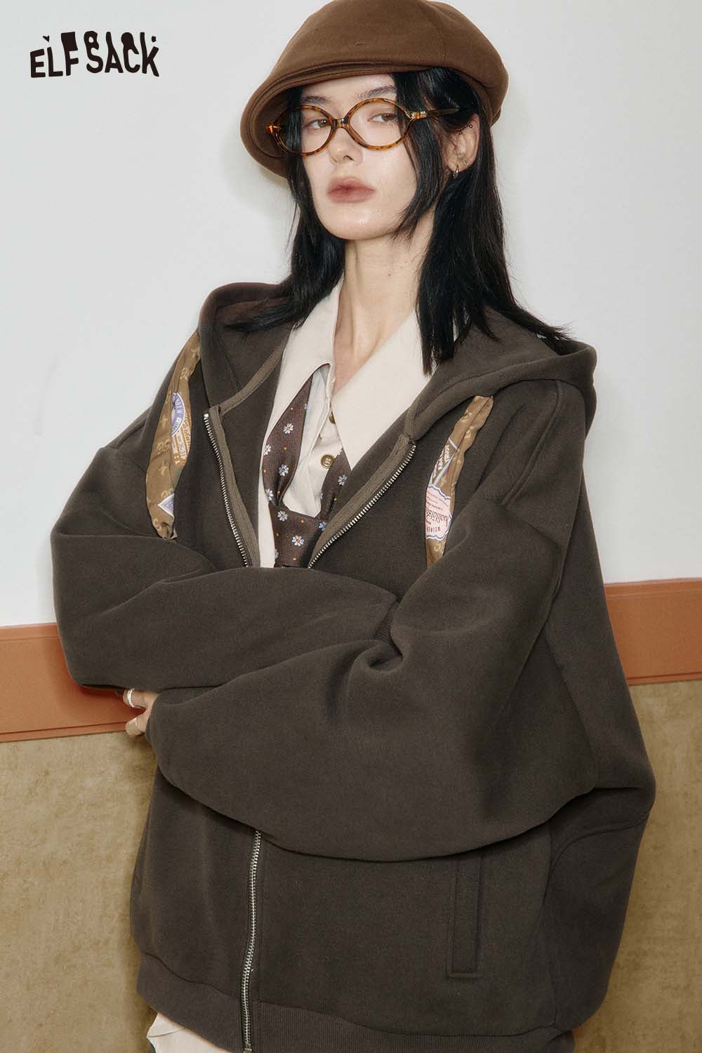 ELFSACK women's graphic print hoodie in brown with unique graphic details for casual style