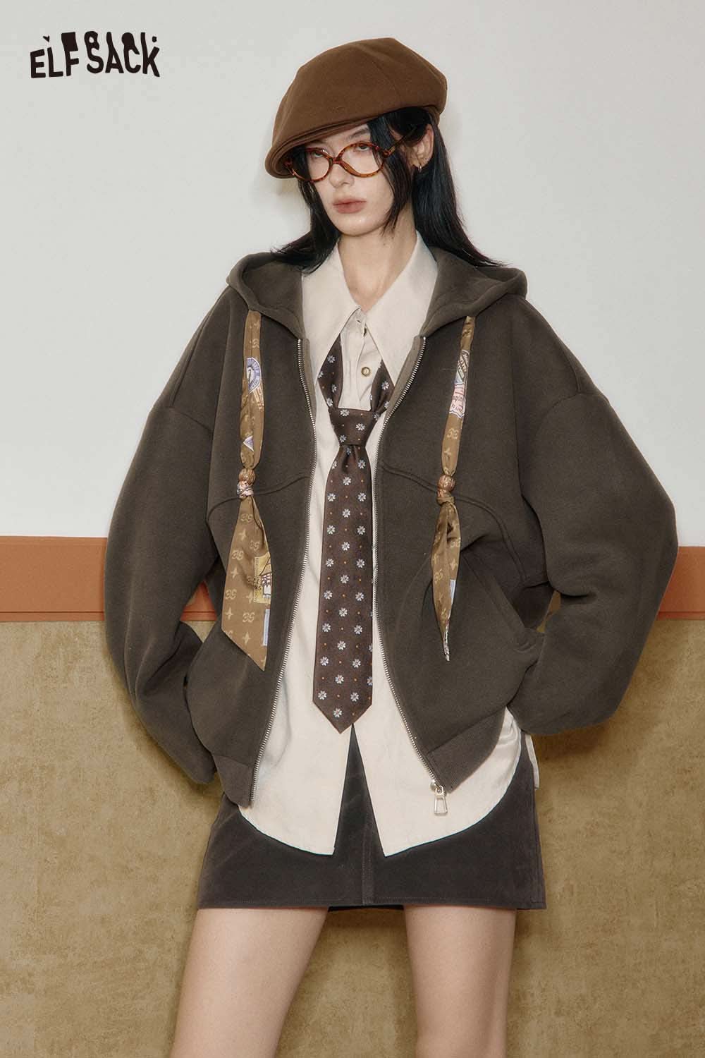 ELFSACK women's graphic print hoodie in olive green with unique design and stylish accessories