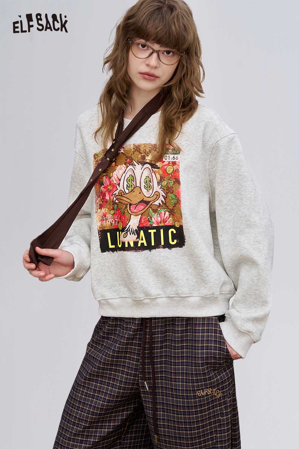ELFSACK women's graphic sweatshirt featuring a colorful whimsical design with a playful character