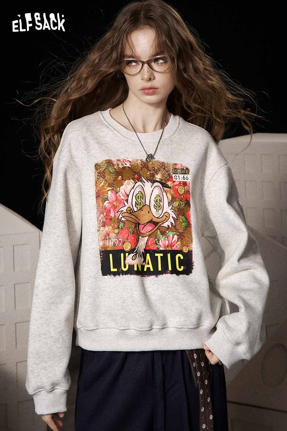 ELFSACK women's graphic sweatshirt featuring a colorful design with a fun cartoon character