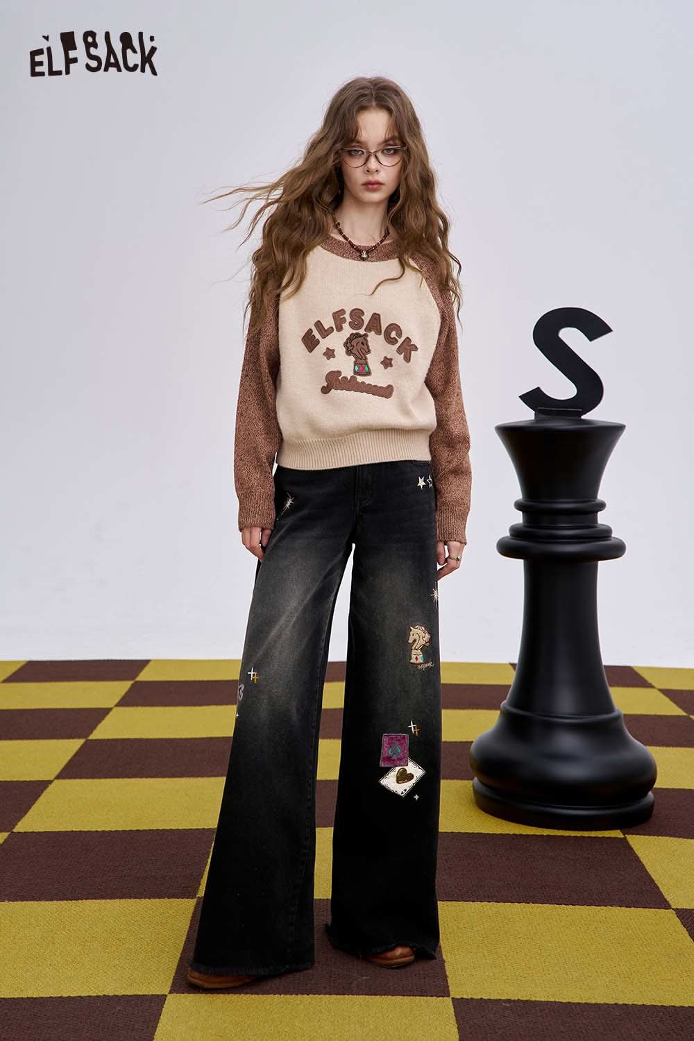 ELFSACK women's graphic wide leg pants in black with unique embroidered designs for stylish comfort