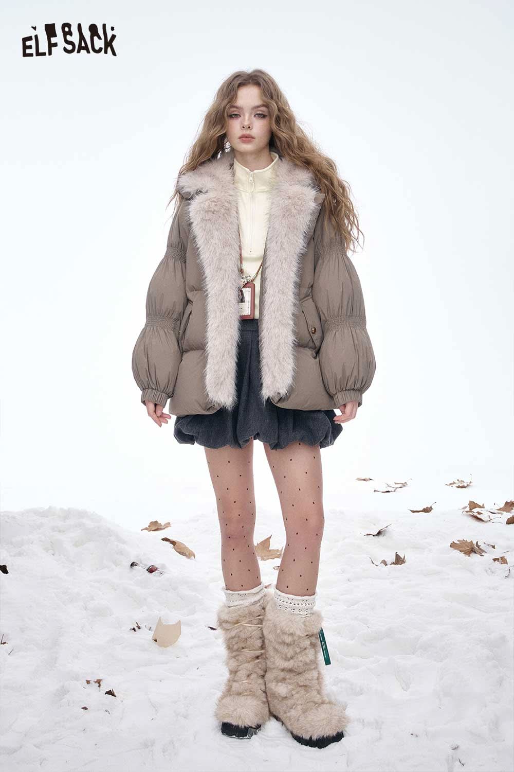 ELFSACK women's half zip high neck t-shirt paired with a stylish winter outfit and fluffy boots