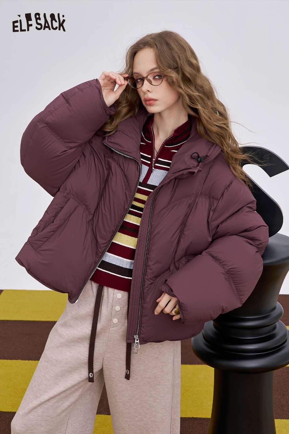 ELFSACK women's half zip knit sweater layered under a stylish oversized puffer jacket