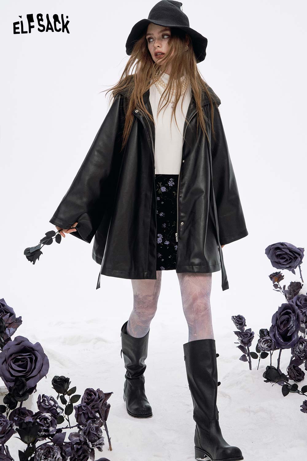 ELFSACK women's high neck pearl t-shirt layered under a stylish black coat with a floral skirt