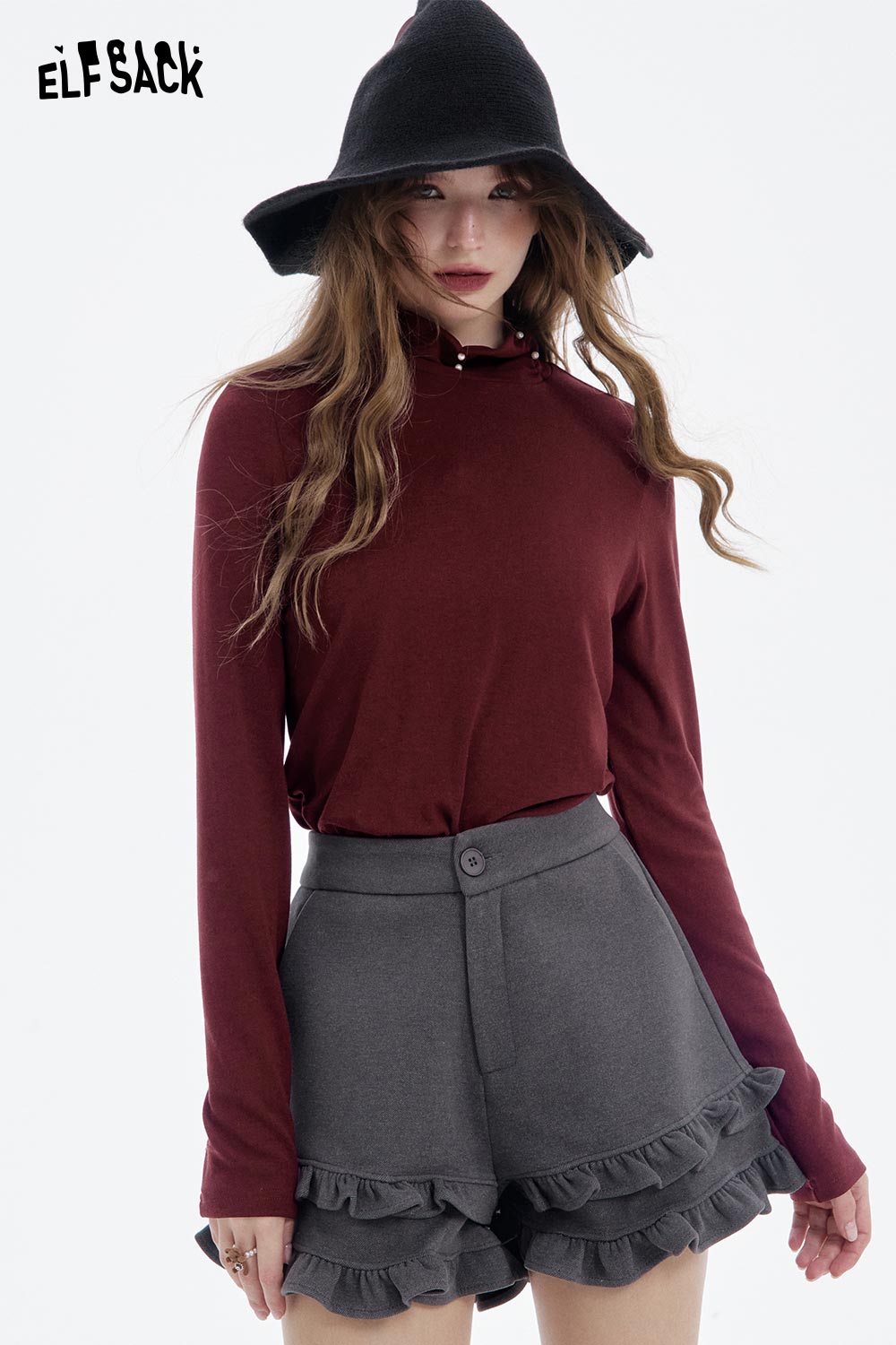 ELFSACK women's high neck pearl t-shirt in burgundy paired with stylish grey ruffled shorts