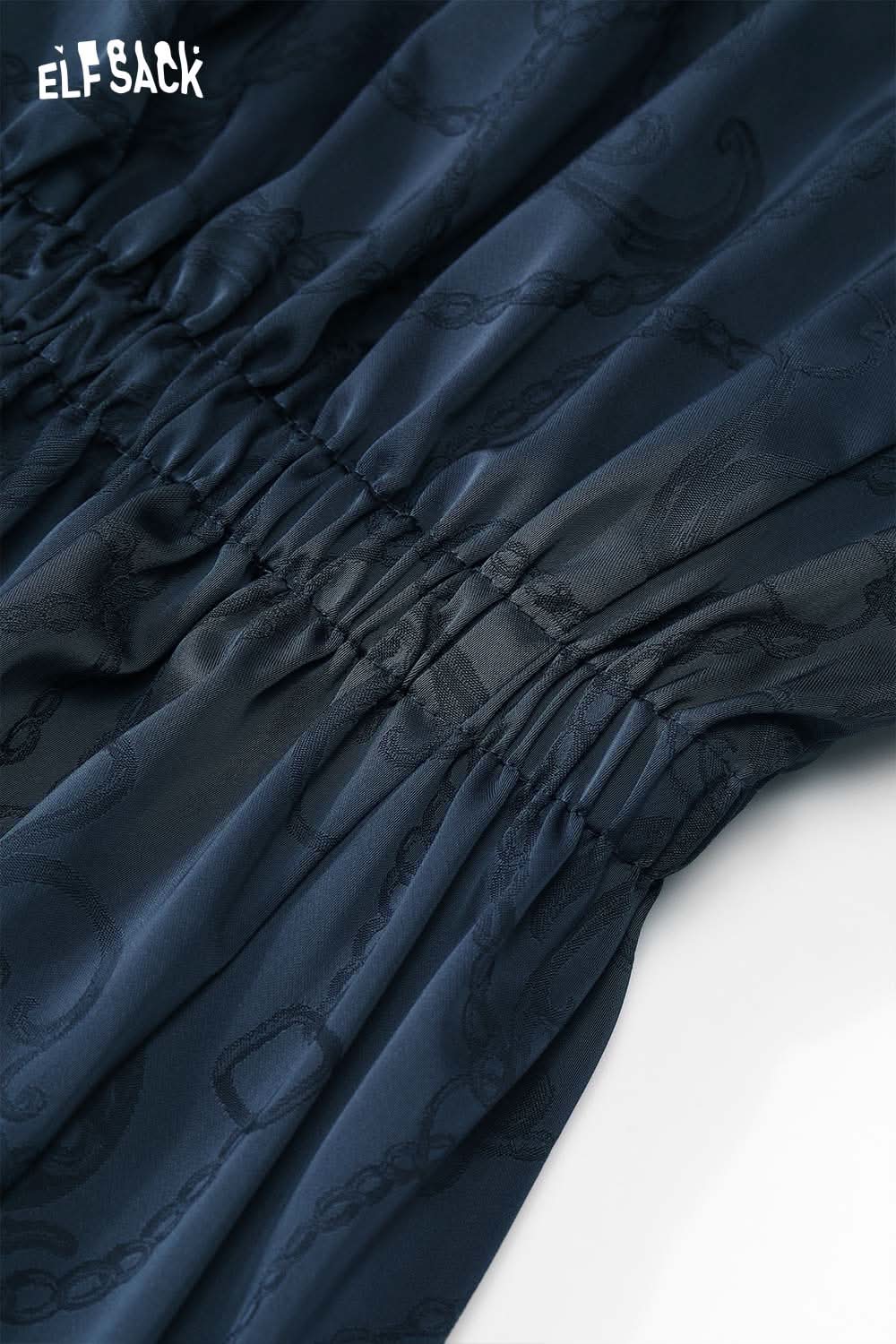 Close-up of ELFSACK women's hooded bow jacket featuring a stylish gathered design in dark fabric
