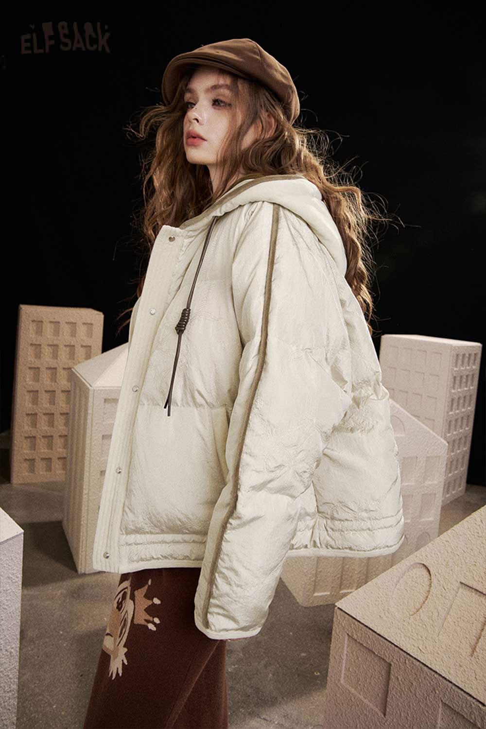ELFSACK women's hooded down jacket in cream color for stylish winter warmth and comfort
