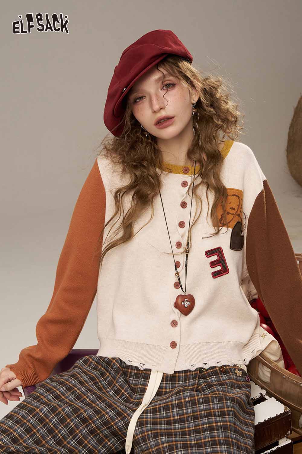 ELFSACK women's knitted jacket with colorful patches and buttons for a cozy, trendy look