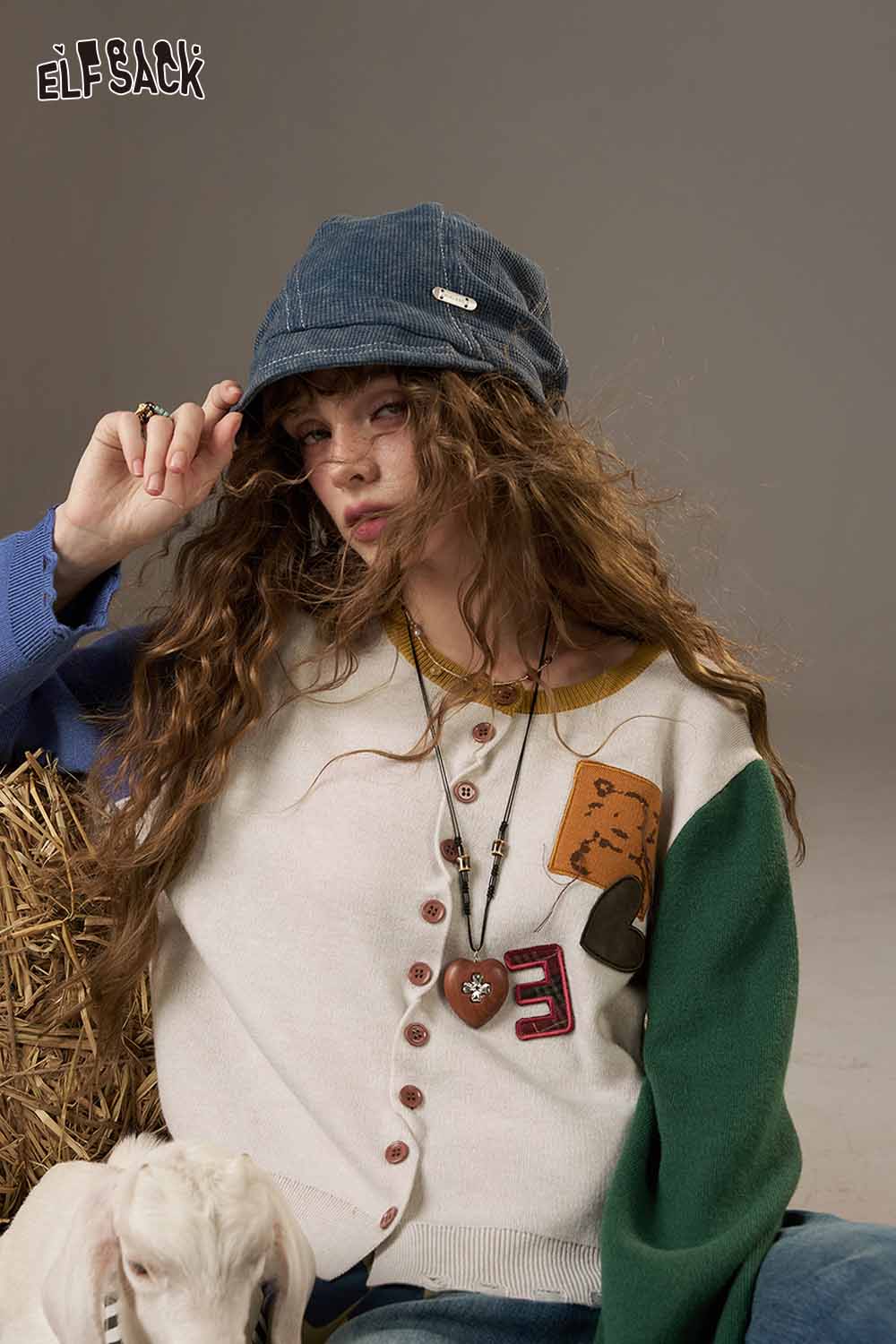 ELFSACK women's knitted jacket featuring colorful patches and a button-up design for a trendy look