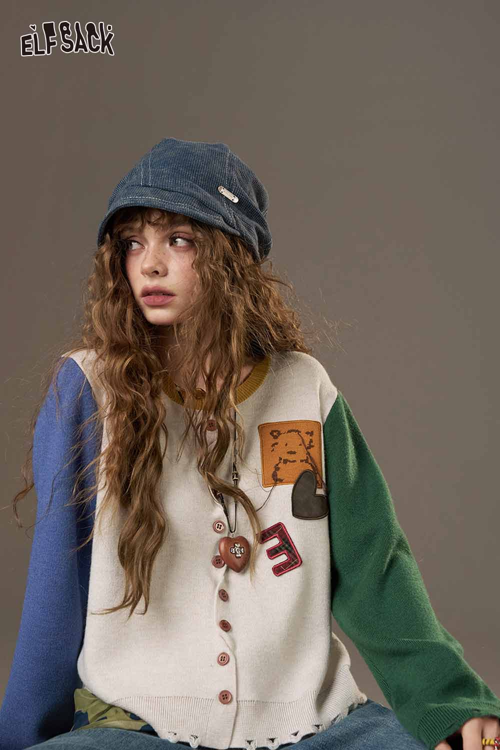 ELFSACK women's knitted jacket featuring colorful patchwork design and button closure