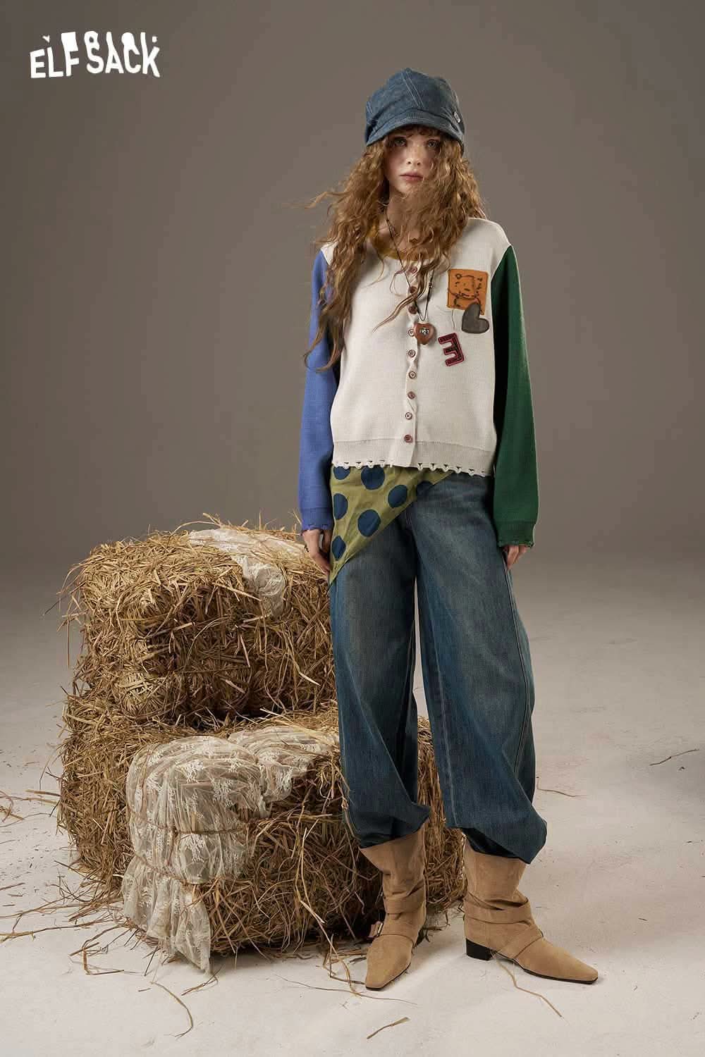 ELFSACK women's knitted jacket in a unique design paired with stylish baggy jeans and boots
