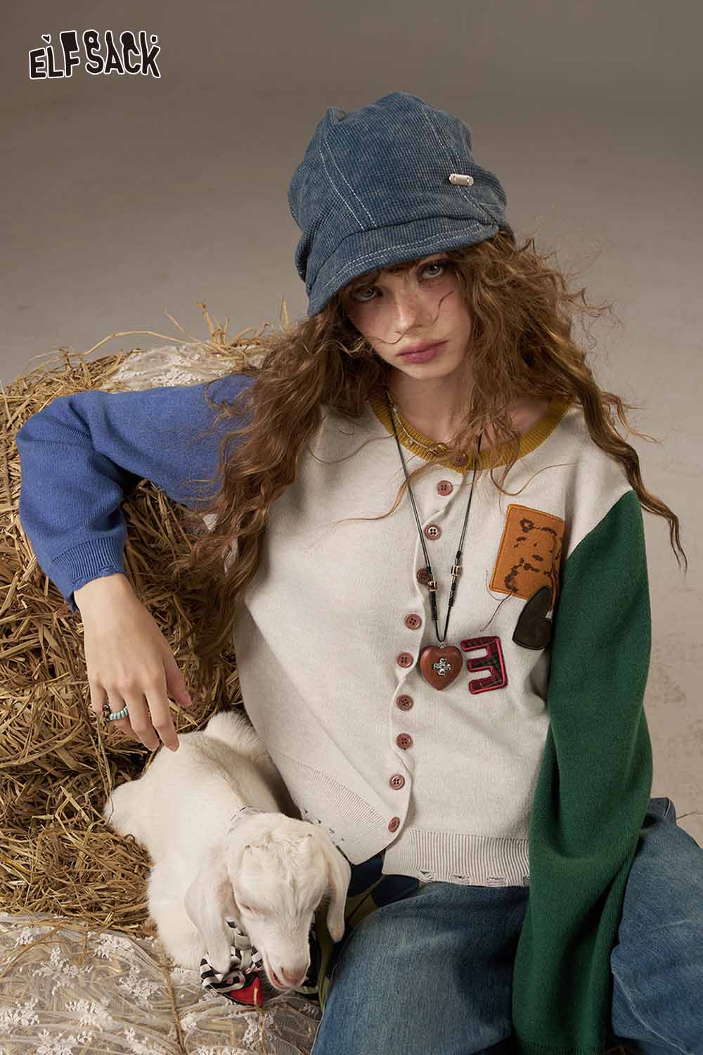 ELFSACK women's knitted jacket with colorful sleeves and buttons for a stylish look