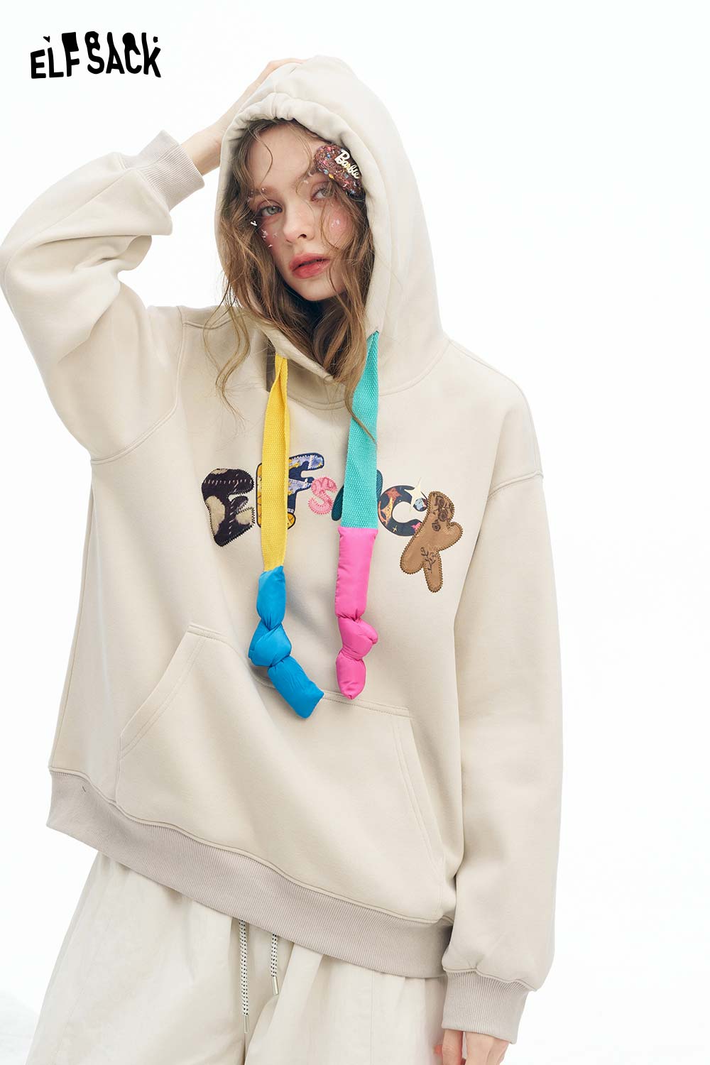 ELFSACK women's letter graphic hoodie in beige with colorful decorative ties for a stylish look