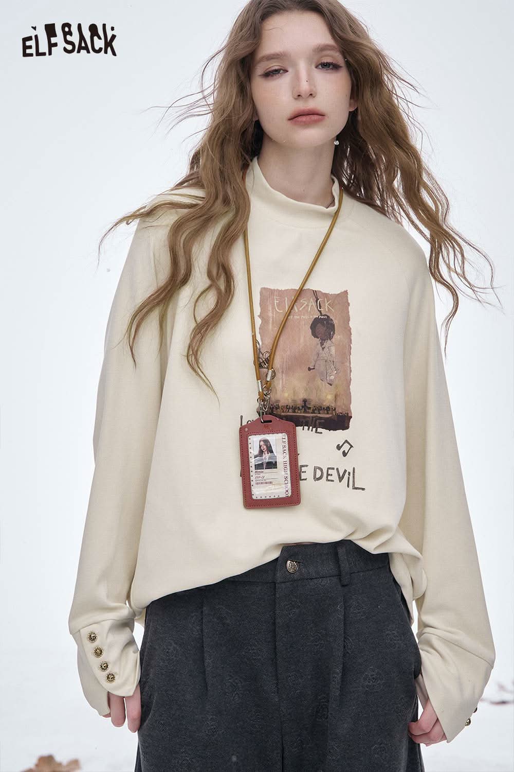 ELFSACK women's letter graphic long sleeve t-shirt in cream with artistic design and relaxed fit