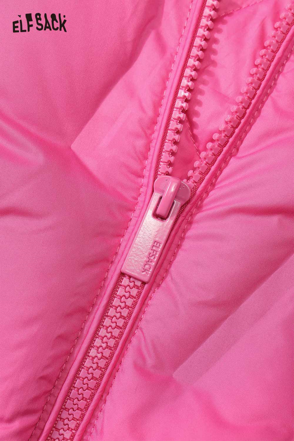 Close-up of ELFSACK women's light down jacket in vibrant pink featuring a sturdy zipper design