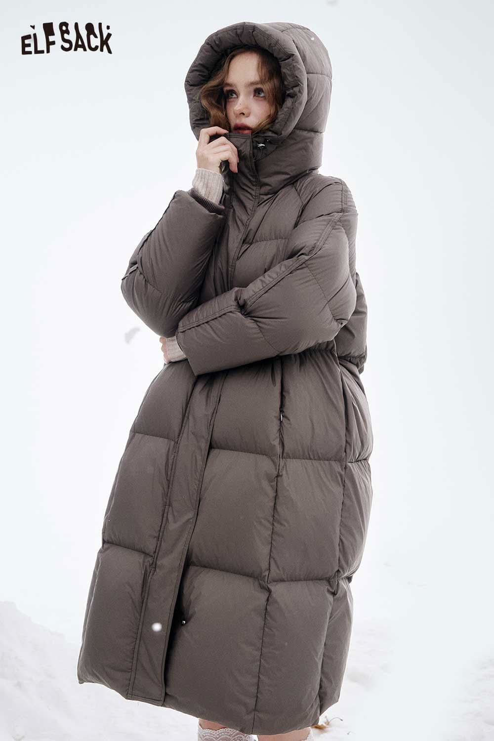 ELFSACK women's long hooded down jacket in brown, featuring a cozy oversized fit, perfect for winter warmth