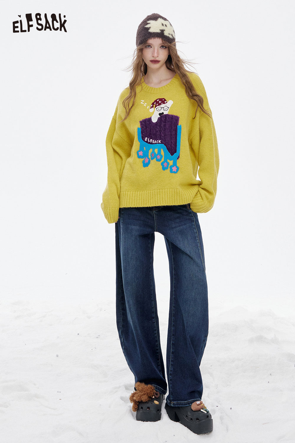 ELFSACK women's loose fit floor length jeans styled with a colorful oversized sweater