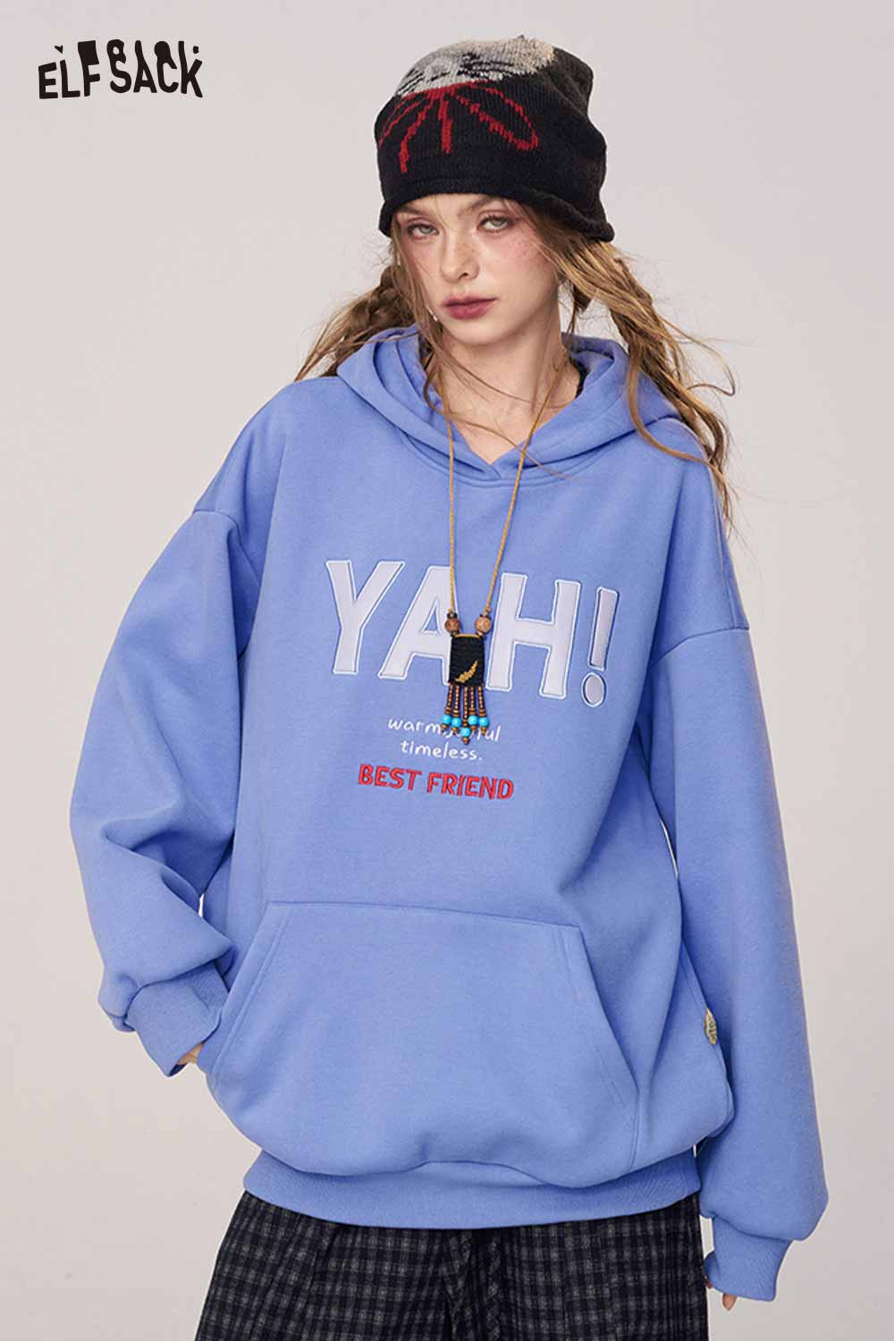 ELFSACK women's loose fit hooded sweatshirt in light blue with playful text and oversized design