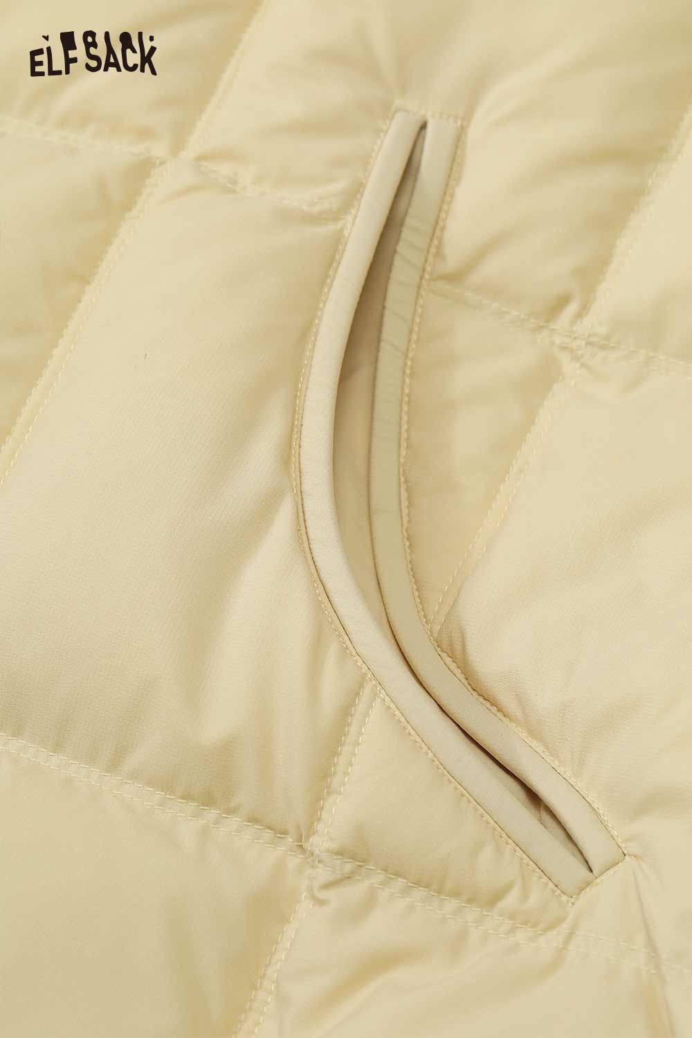 Close-up of women's nylon puffer jacket by ELFSACK featuring a stylish quilted design and hidden pockets