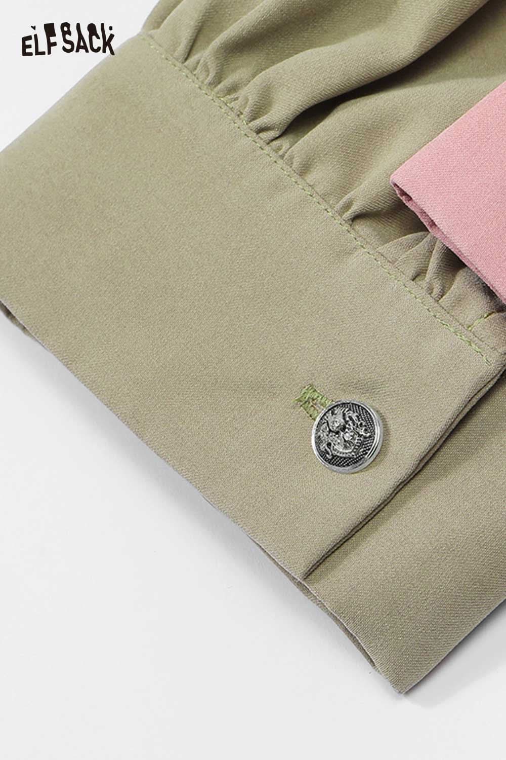 Close-up of ELFSACK women's oversized contrast shirt with unique button detail and soft fabric